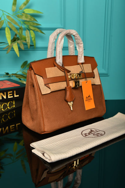 - The Birkin 25’ Suede