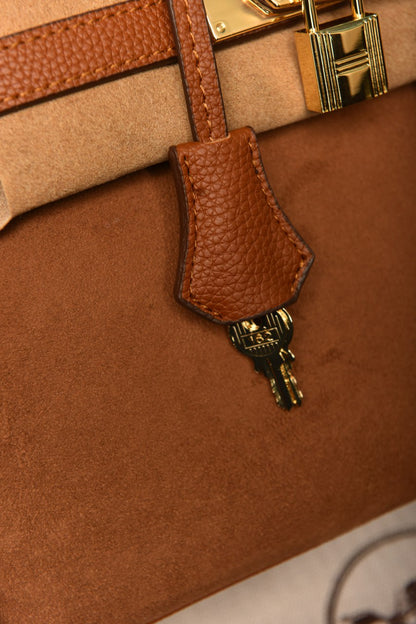 - The Birkin 25’ Suede